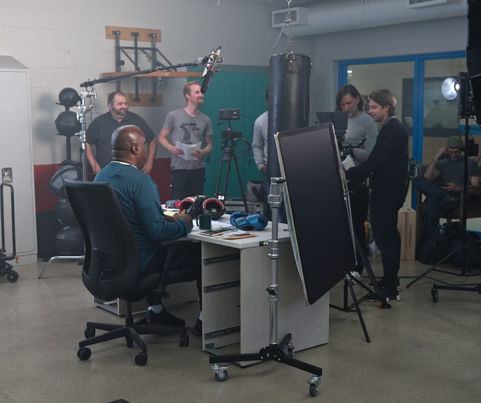 The Goodwin team and James "Buster" Douglas filming their Big Game "Almost Ad."