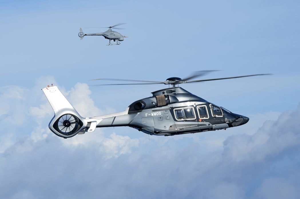 The VSR700 UAS flying in formation with a crewed H160 © Airbus Helicopters / Anthony Pecchi