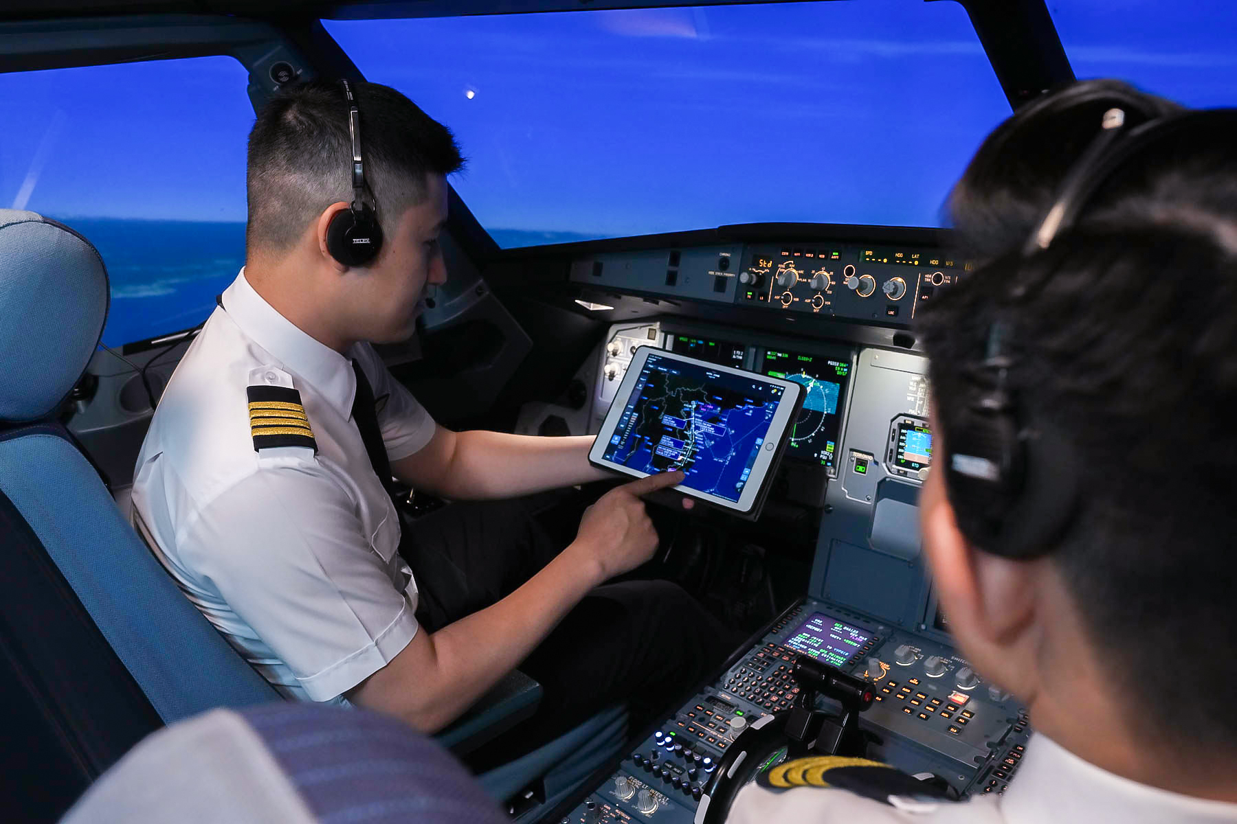 Pilots in Full Flight Simulator